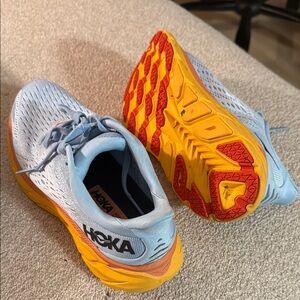 Hoka Sky Blue and Vibrant Orange Sneakers